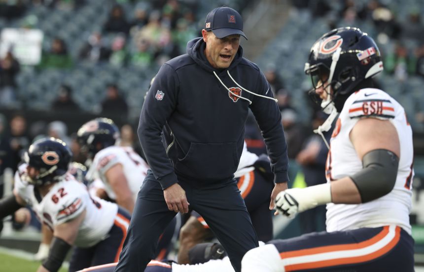 Ben Johnson greets players before the Black Friday game against Philadelphia.