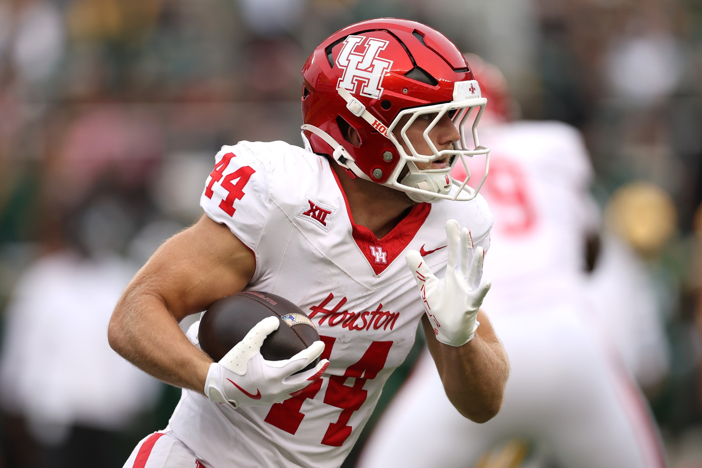 WACO, TEXAS - NOVEMBER 29: Dean Connors #44 of the Houston Cougars runs with the ball during the first quarter against the Baylor Bears at McLane Stadium on November 29, 2025 in Waco, Texas. (Photo by Sam Hodde/Getty Images)