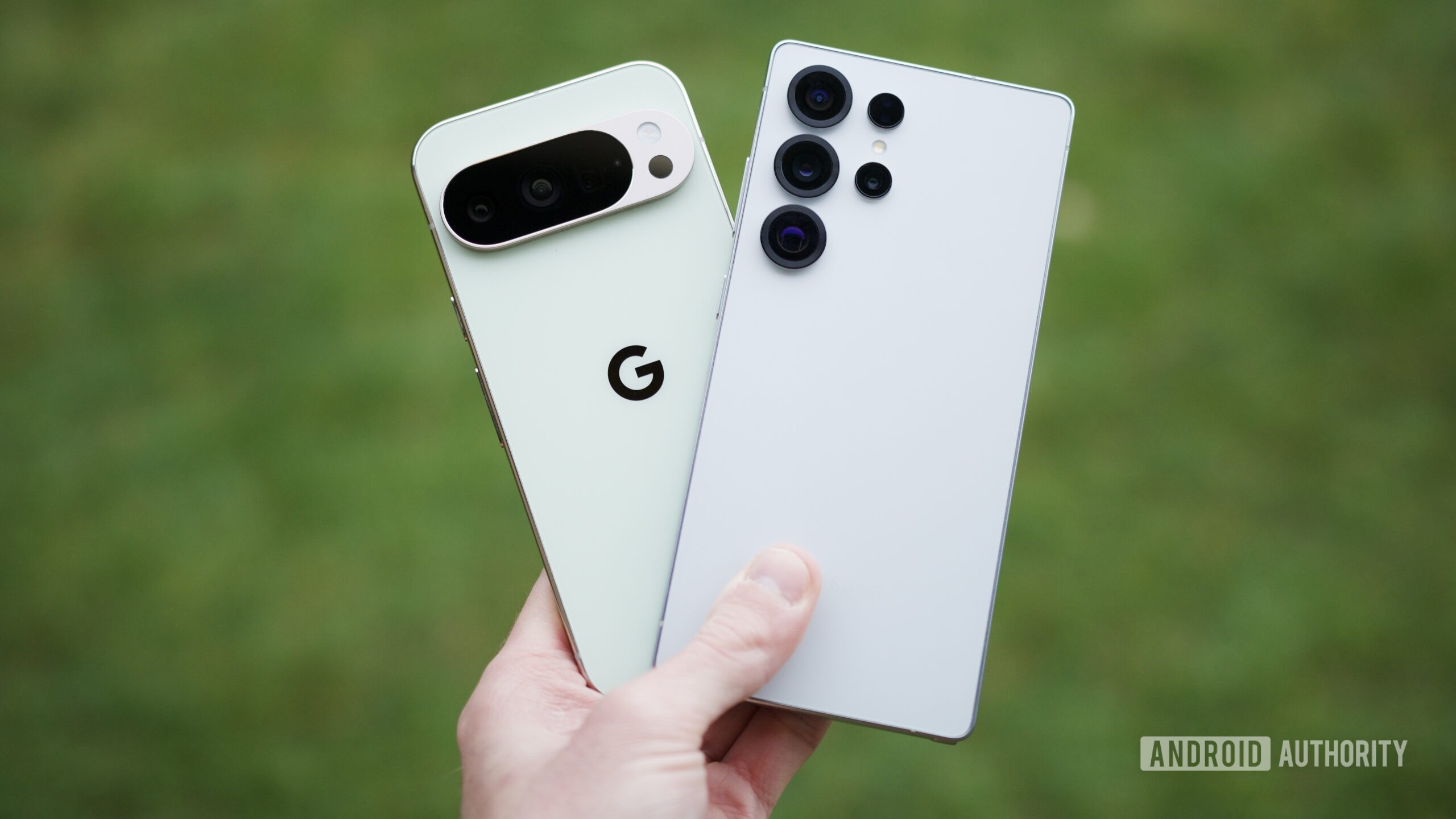 Someone holding the Google Pixel 10 Pro and Samsung Galaxy S25 Ultra.