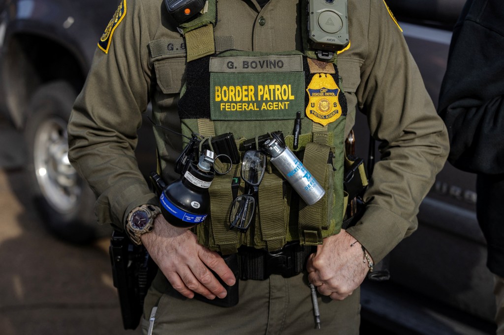 Close-up of Border Patrol agent Greg Bovino's uniform and gear.