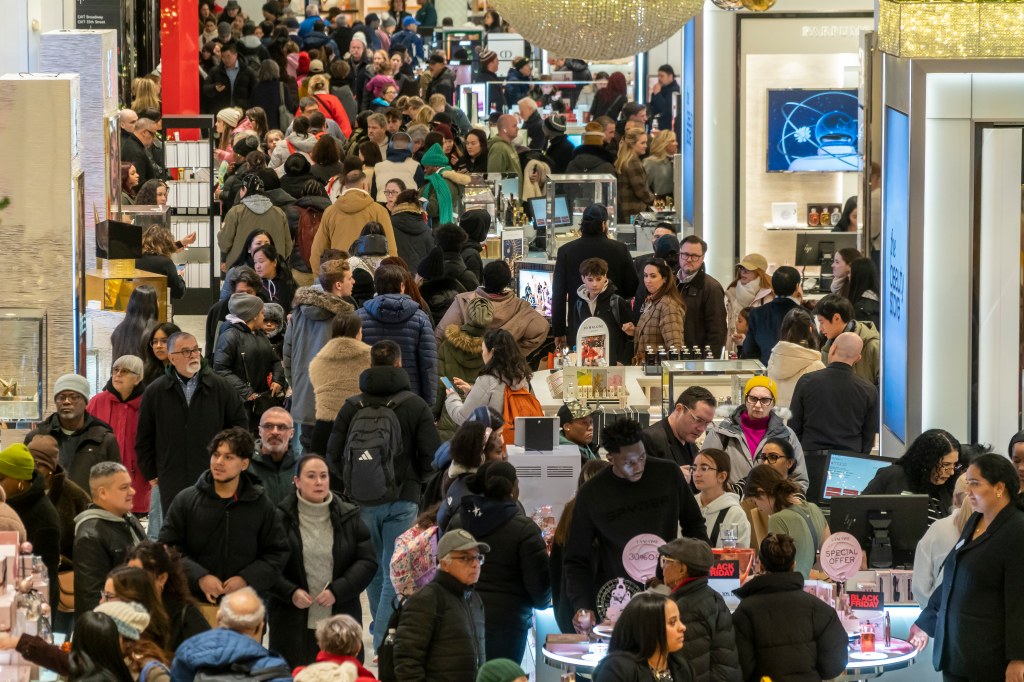 A new AP-NORC poll finds this holiday season is financially stressful for many Americans, with shoppers dipping into savings, hunting for bargains and cutting back on spending.