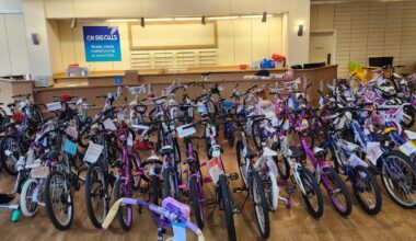JEA volunteers assemble and inspect over 100 bicycles at Salvation Army Angel Tree – Action News Jax