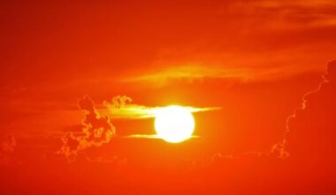 a sun in an orange sky