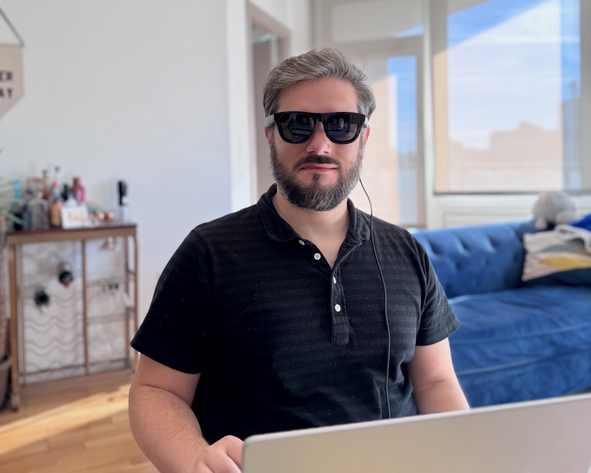 author wearing xreal one pro glasses