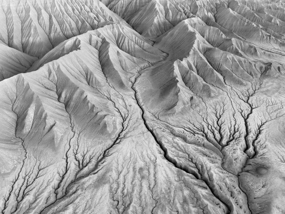 A black-and-white photo by Matt Payne of desert landforms in Utah