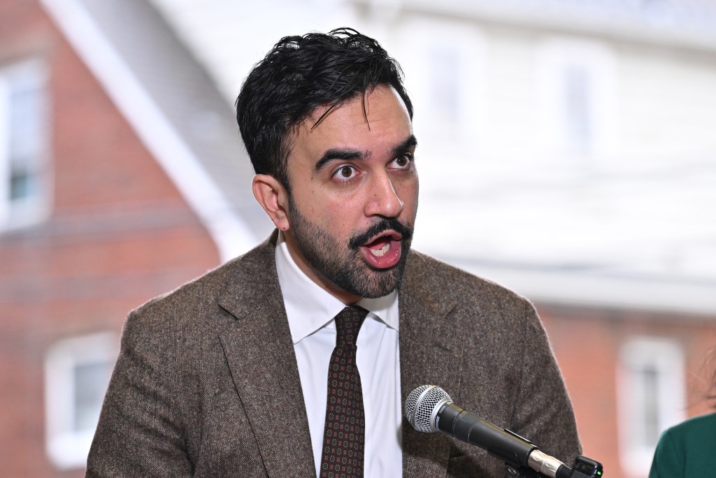 New York City’s mayor-elect Zorhan Mamdani speaking at a podium.