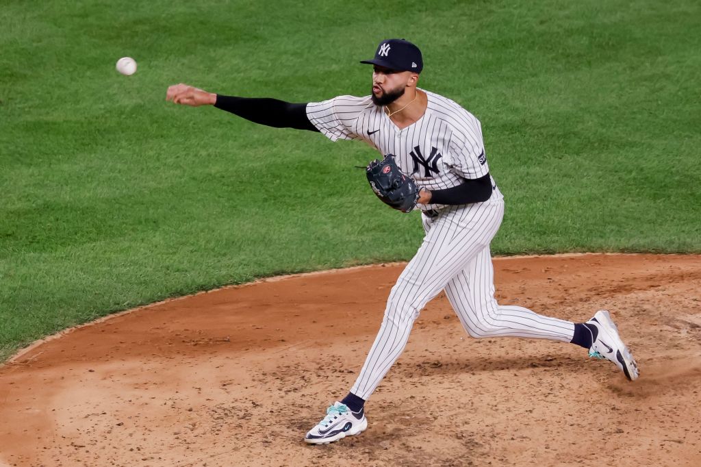 New York Yankees pitcher Devin Williams delivers a pitch.