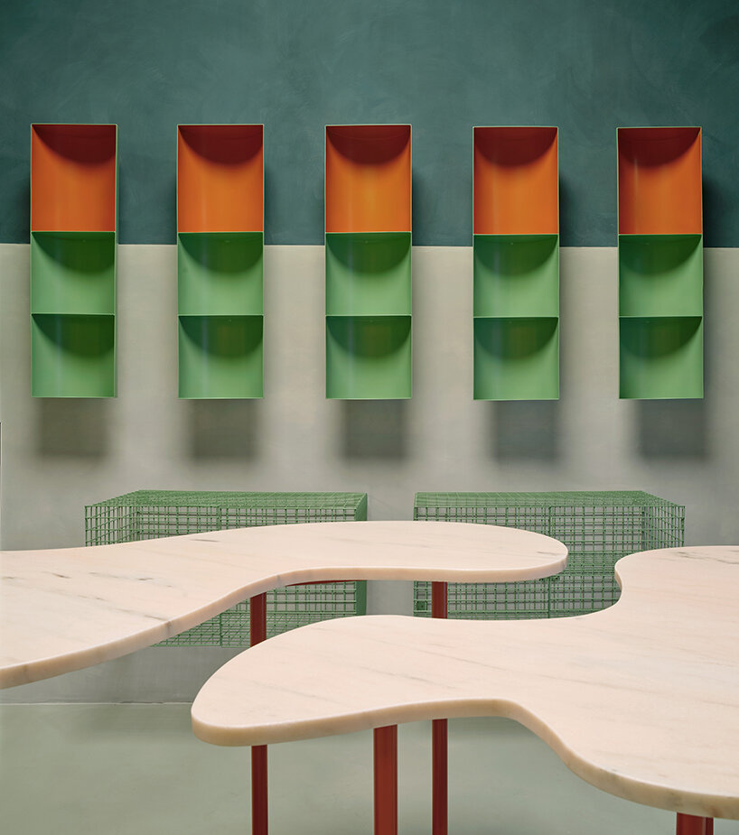organic marble tables and vibrant hues complete madrid store by lucas y hernández-gil