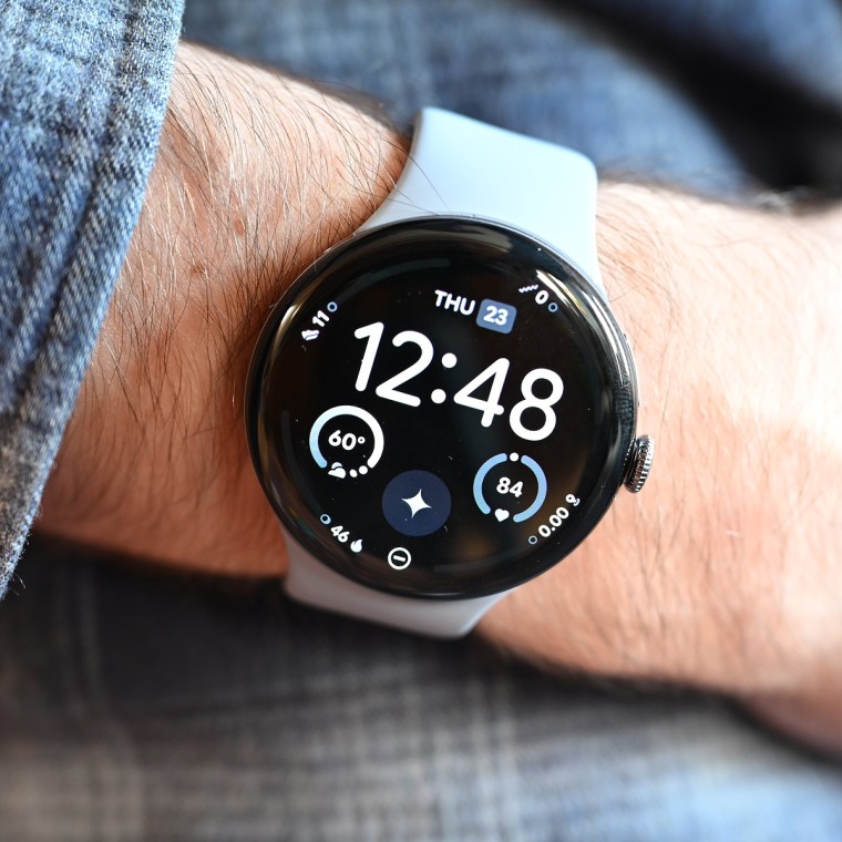 A close-up of the Google Pixel Watch 4 on the wrist of the writer.