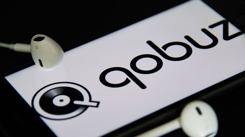 A smartphone with Qobuz logo displayed