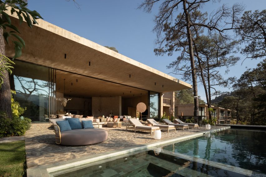 Living room and terrace at Rancho del Bosque house in Valle de Bravo by Sordo Madaleno