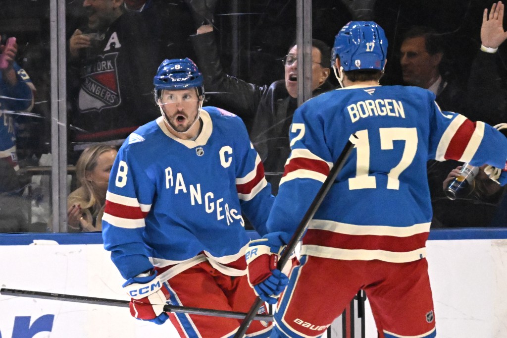 Rangers center J.T. Miller (8) reacts after scoring a goal against the Canadiens.