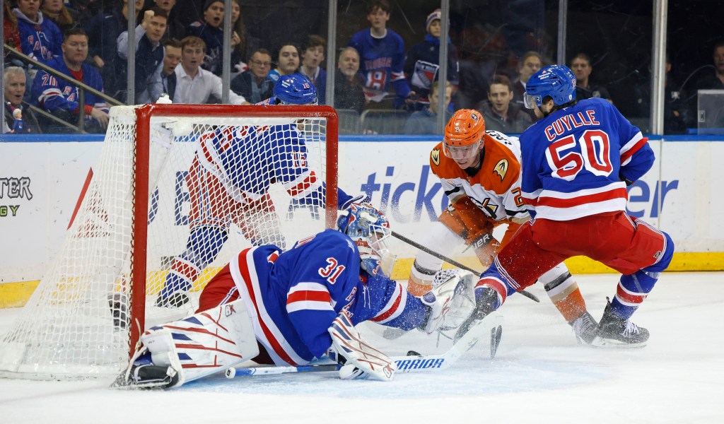 Anaheim Ducks defenseman Jackson Lacombe (2) scores a goal past New York Rangers goaltender Igor Shesterkin (31) off a rebound during the second period.