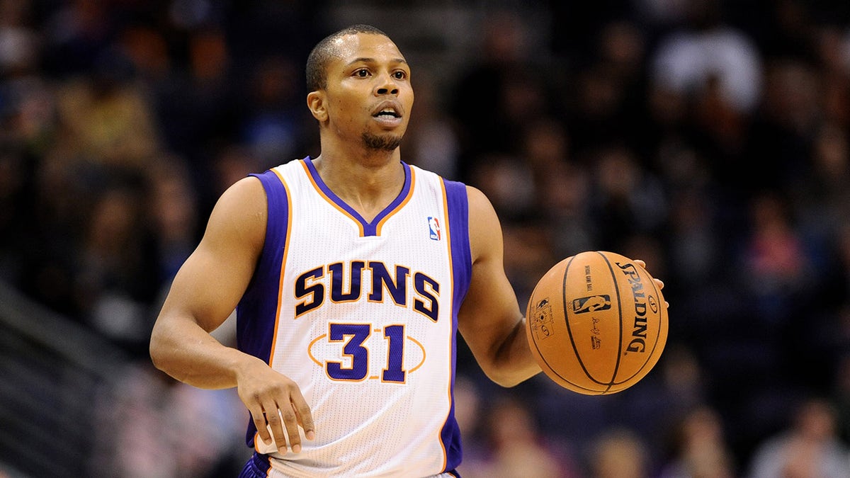 Sebastian Telfair plays takes the ball up the court during a game