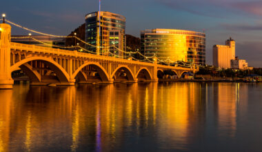 Downtown tempe lit by the sunset behind tempe town lake
