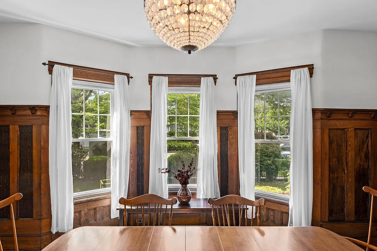 dining room with wainscoting, plate shelf and Lincrusta