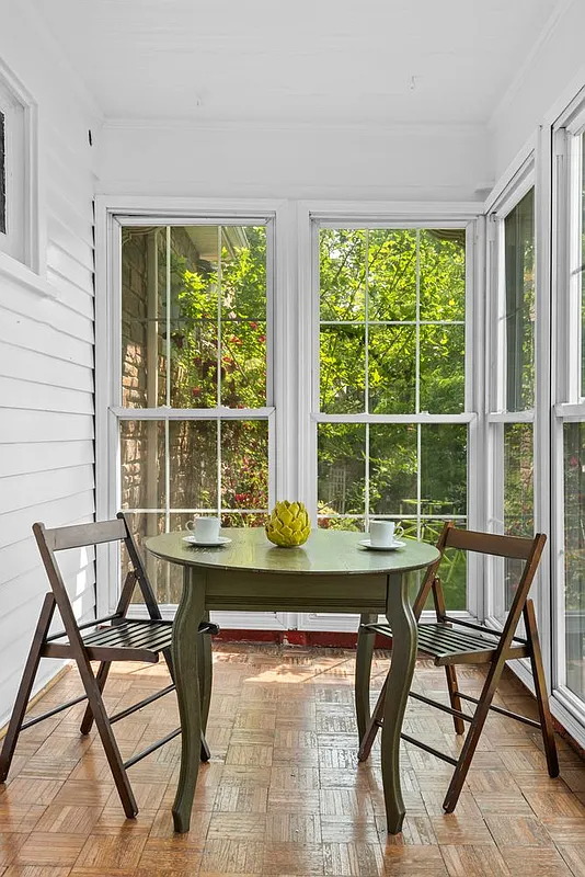 glassed-in front porch