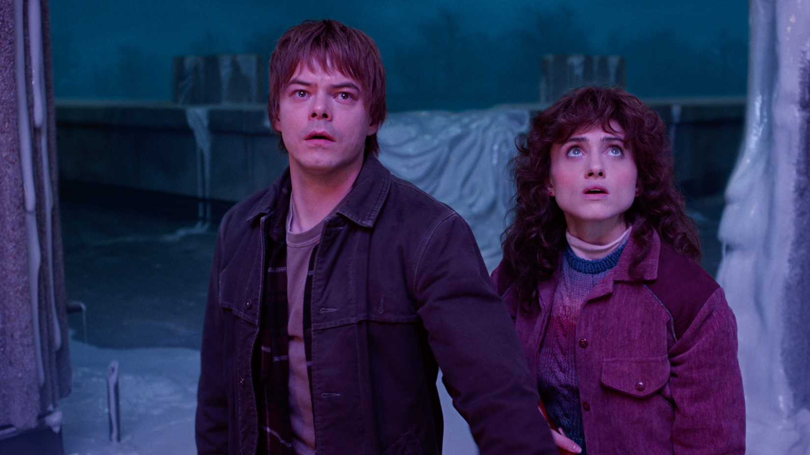 Jonathan and Nancy in a room filled with goo in Stranger Things.