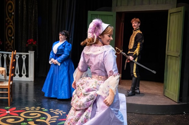 Melissa Fernandes, left, Megan Carmitchel, center, and Spencer Gerber in Lamb's Players Theatre's "Arms and the Man. (J.T. MacMillan)