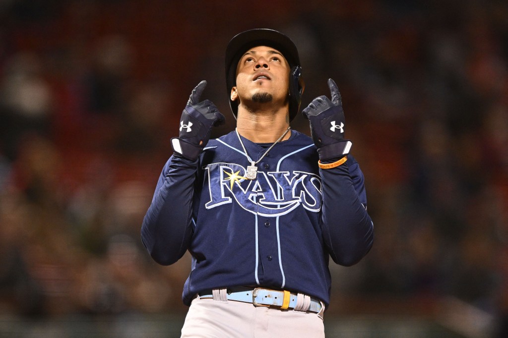 Tampa Bay Rays shortstop Wander Franco (5) reacts after hitting a solo home run against the Boston Red Sox during the first inning at Fenway Park.