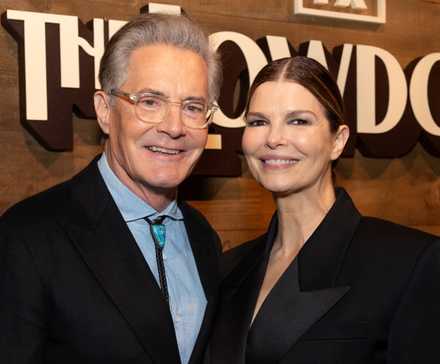 Kyle MacLachland and Jeanne Tripplehorn standing together on the red carpet at the premiere of The Lowdown
