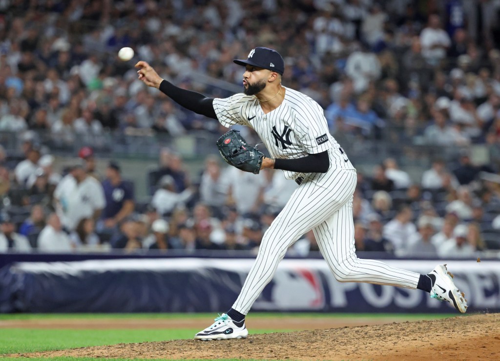 New York Yankees pitcher Devin Williams #38 throws a pitch during the 7th inning.