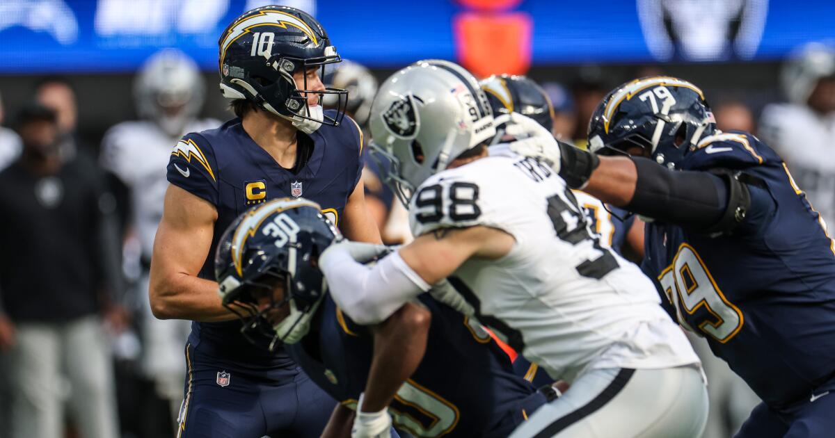 Chargers overcome Justin Herbert injury scare to defeat Raiders