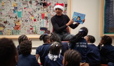 Barack Obama in Santa hat surprises school children during visit to Chicago