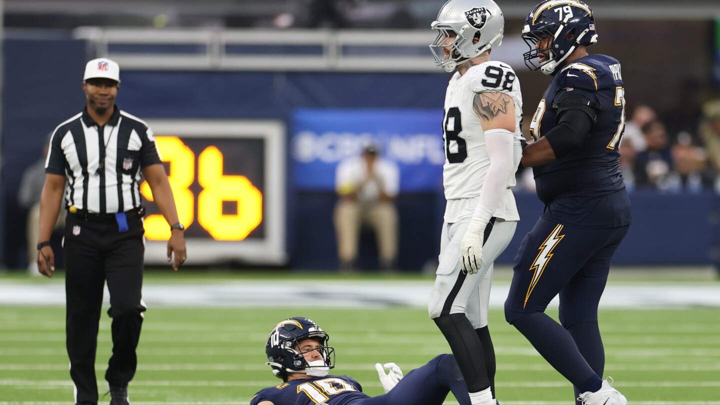 Maxx Crosby says Justin Herbert flopped when Crosby pushed him