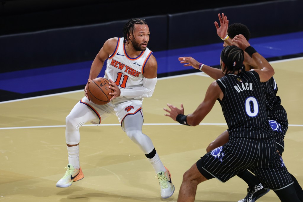 Jalen Brunson of the New York Knicks handles the ball against the Orlando Magic.