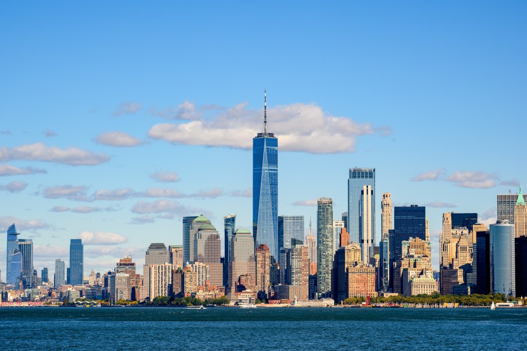 Downtown Manhattan skyline with One World Trade Center at the center.