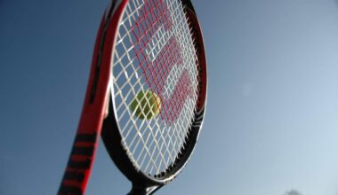 Racket hitting a tennis ball