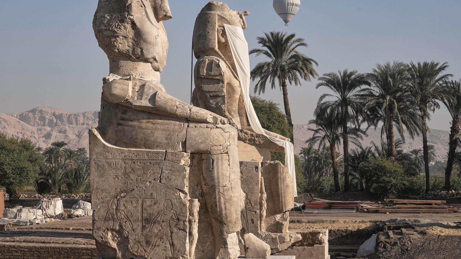 Egypt reveals restored colossal statues of pharaoh in Luxor