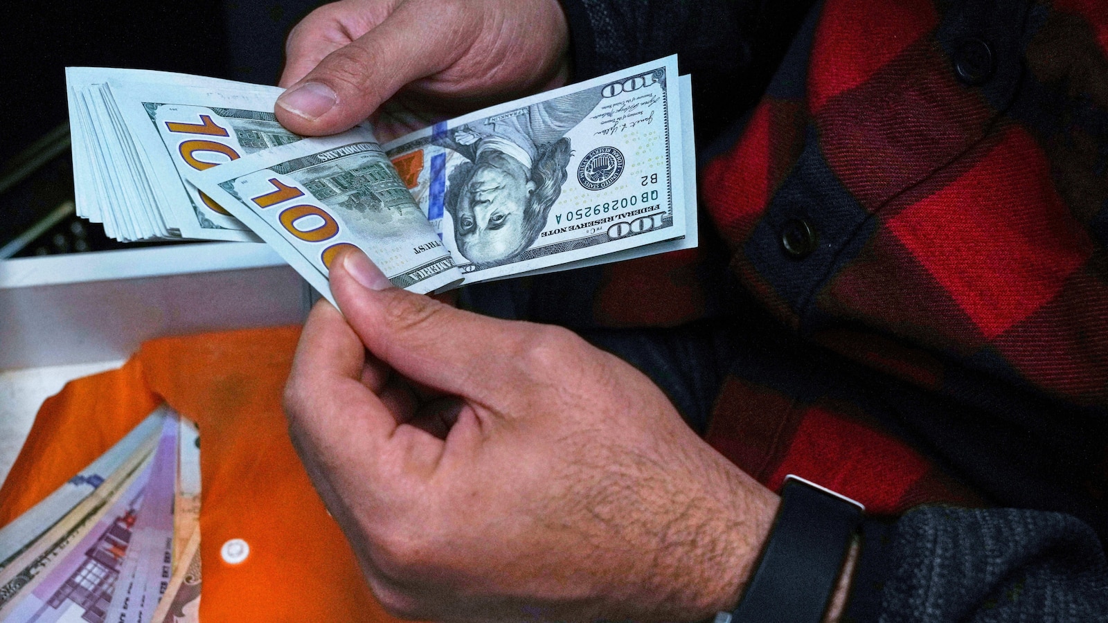 Iranian traders and shopkeepers protest as currency hits record low