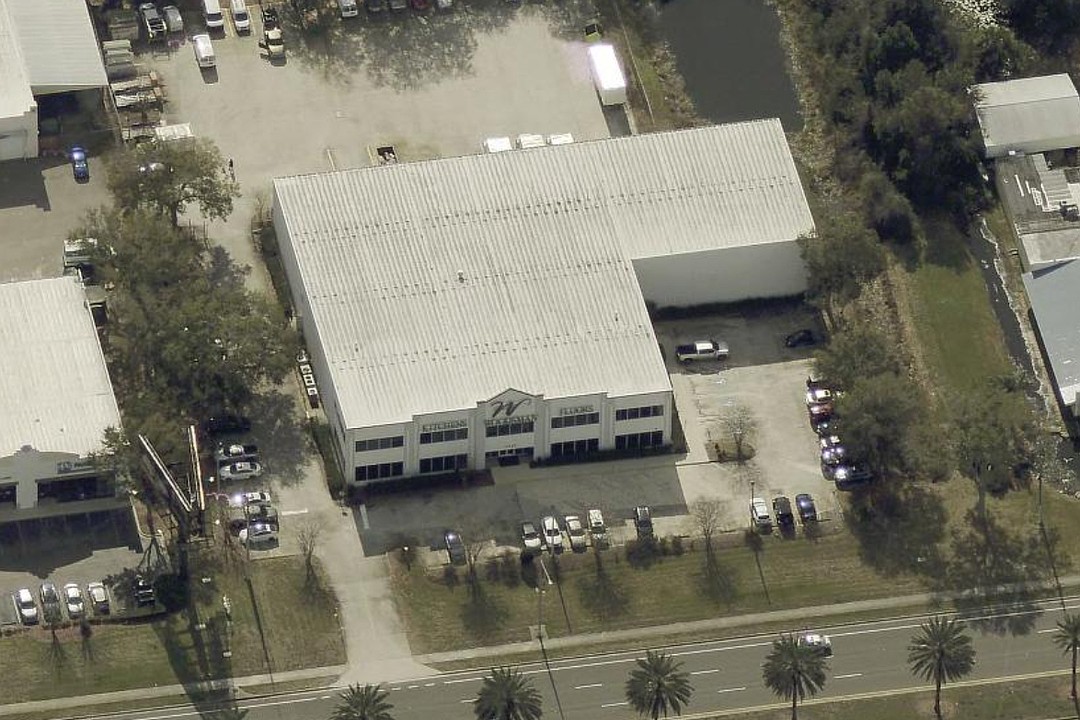 Woodsman Kitchen & Floors showroom building part of $28.33 million sale