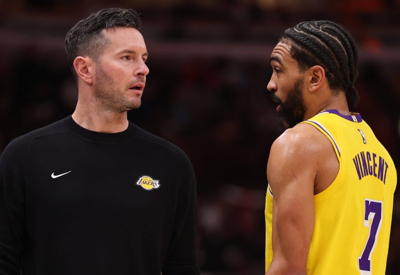 Los Angeles Lakers coach J.J. Redick, left, has given high praise to Gabe Vincent for his leadership and flexibility in changing his role on the team.