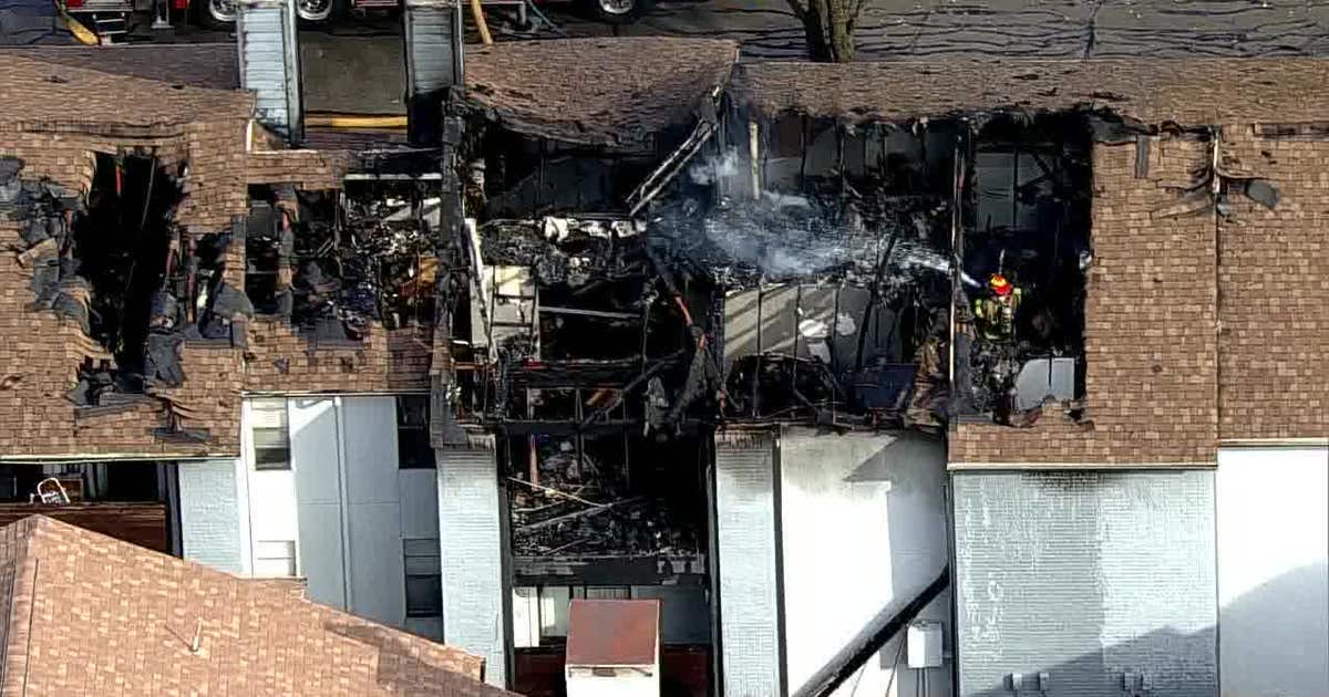 Bedford apartment fire leads to partial roof to collapse