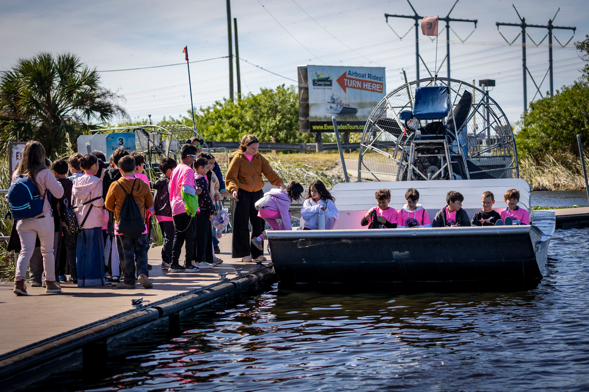 The Everglades are an important draw for tourists and recreationists, such as these children at Sawgrass Recreation Park in Weston, Fla. Credit: Jose Iglesias/Miami Herald