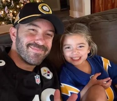 Riverside radio personality Anthony Donatelli and his toddler daughter. (Photo courtesy Rick Griffin/MarketInk)