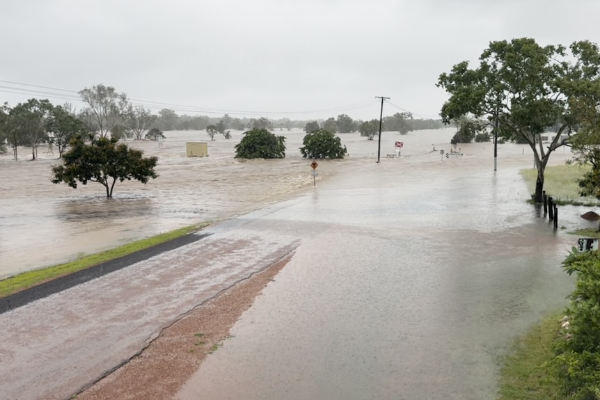 Partially flooded road and landscape