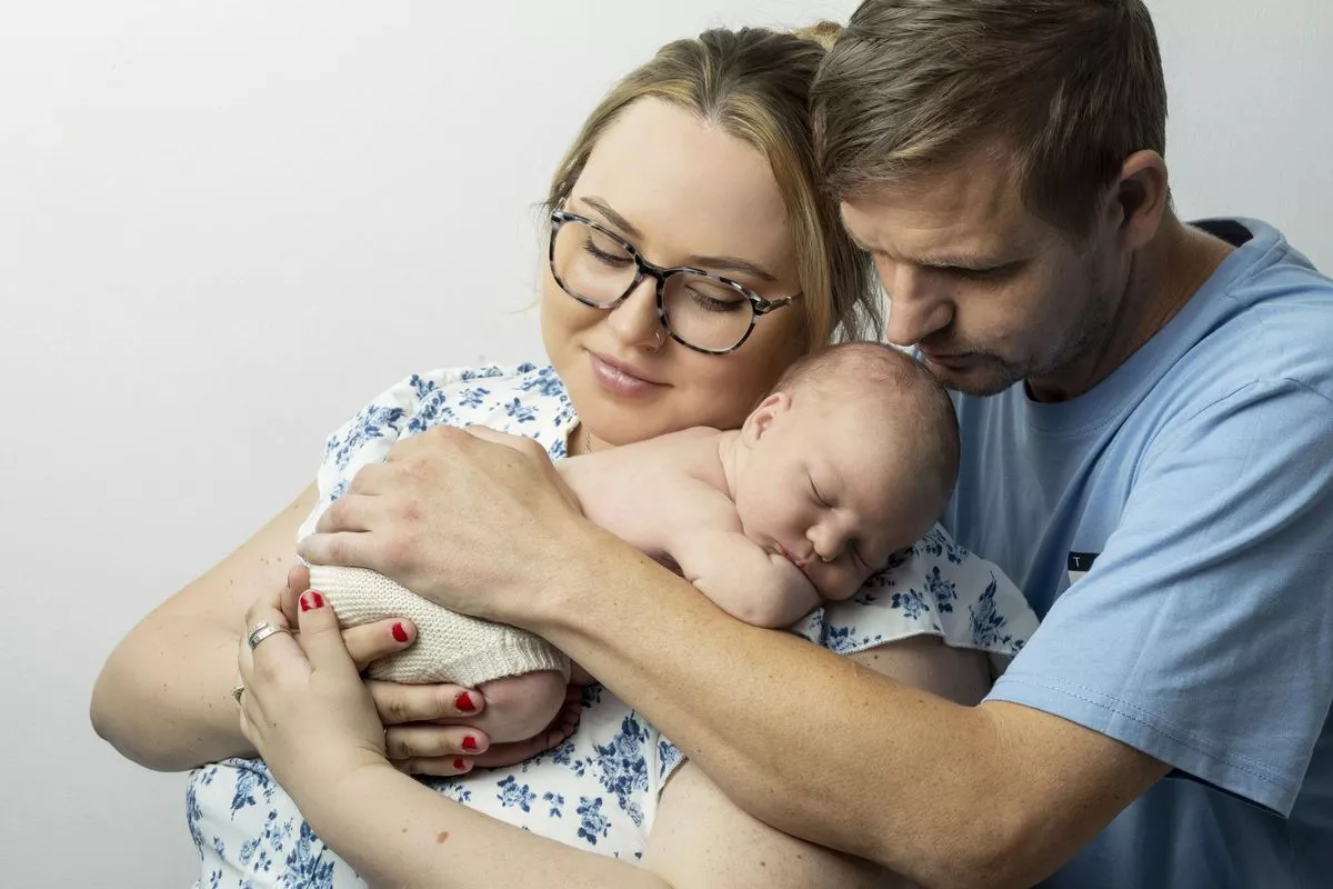 Molly with fiancé Michael and son Hudson (Kennedy News/Martin Steel Photography)