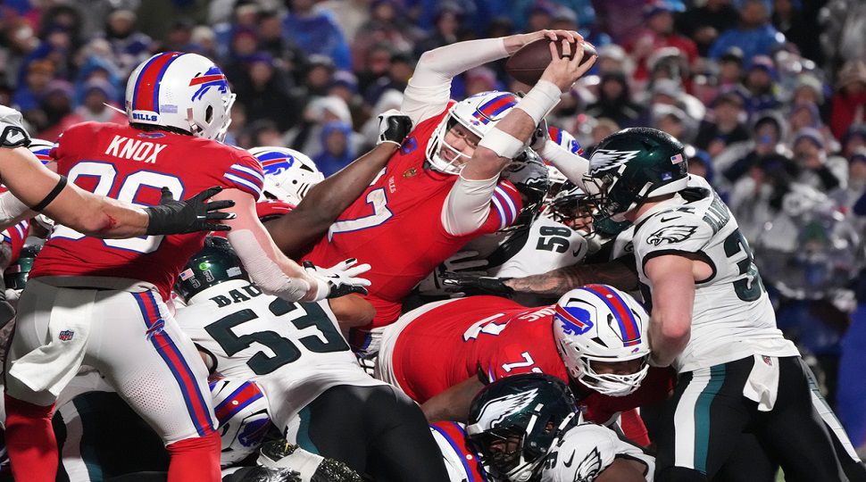 Buffalo Bills' Josh Allen (17) scores a touchdown during the second half of an NFL football game against the Philadelphia Eagles, Sunday, Dec. 28, 2025, in Buffalo, N.Y. (AP Photo/Gene J. Puskar)