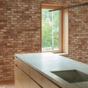 © Jake Balston 103 Grand Residential Building / Of Possible - Interior Photography, Wood, Brick, Countertop