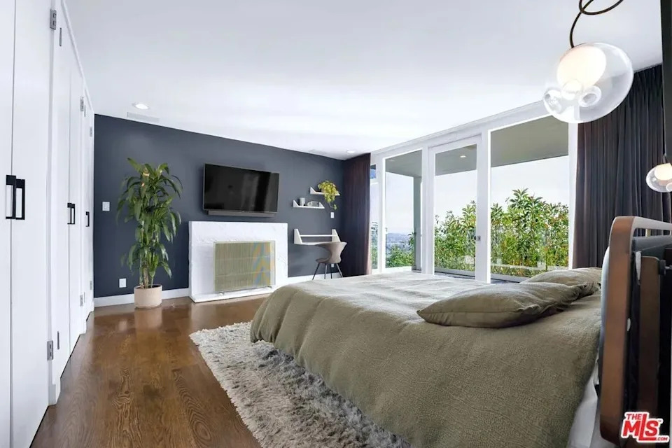 The home comes with plans for an additional primary suite, expanding the already luxe sleeping accommodations.