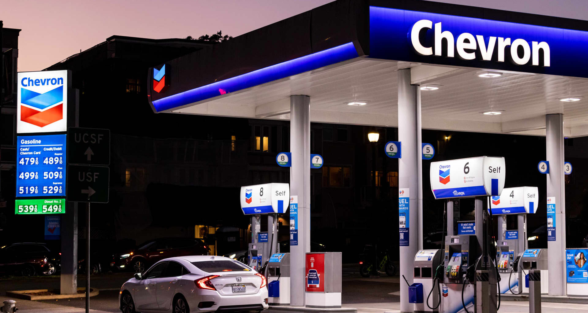 Stocks making the biggest moves premarket: CVX, QXO, DUOL