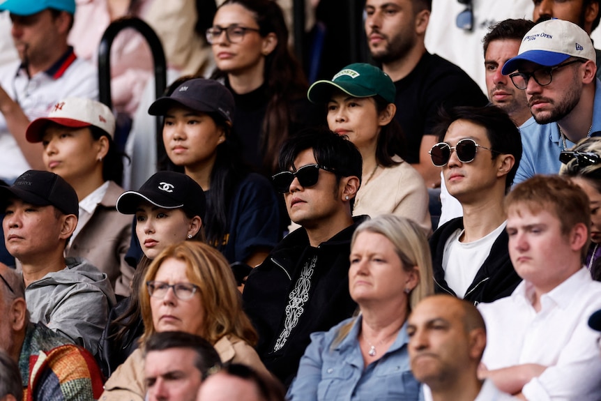 Mandopop King Jay Chou watching Australian Open at the stand