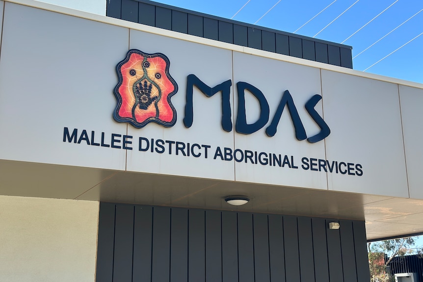 An exterior of concrete building with the words Mallee District Aboriginal Services written across it and a logo.