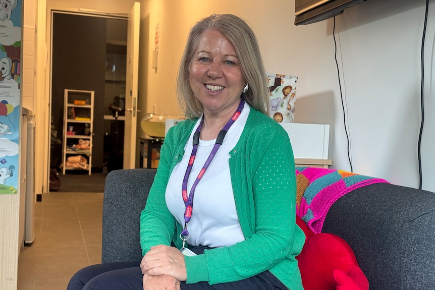Sherri Bruinhout smiles at the camera.