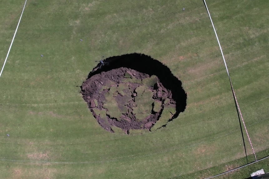 A drone shot of a sinkhole