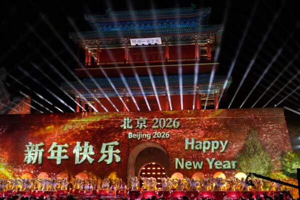 Performers ring in the new year at the Juyongguan Great Wall on the outskirts of Beijing, China, early Thursday, Jan. 1, 2026. (AP Photo/Ng Han Guan)